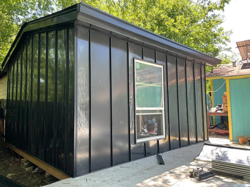 Black standing seam metal wall panels for Roof Inspection in Caernarvon