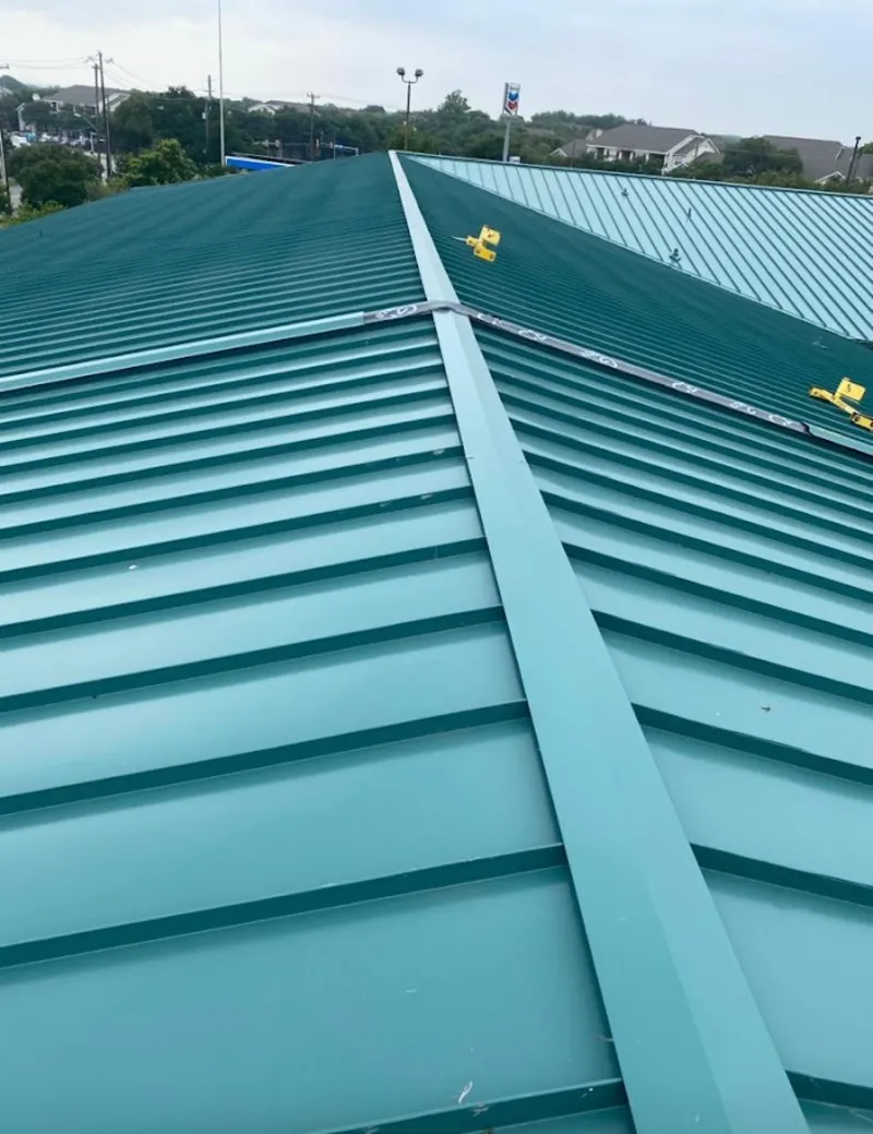 Green commercial metal roof ridge and valley for Metal Roof Repair in Caernarvon